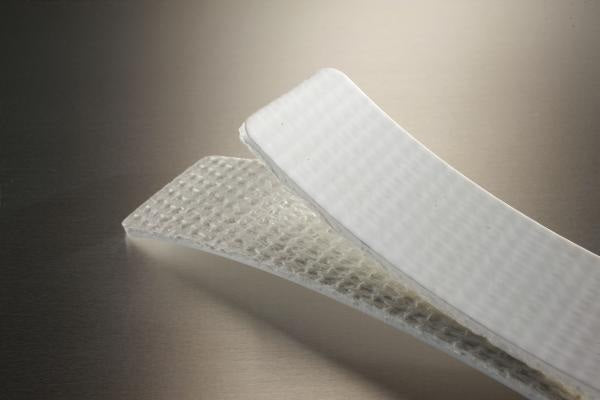 Conveyor belt folded in half to show the white pvc cover and the white fabric bottom
