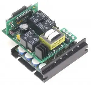 Black chassis mount electronic DC reversing speed controller with solid state dynamic braking circuits and zero-speed detect circuits. Exposed chips, wires, battery and more on green control board.